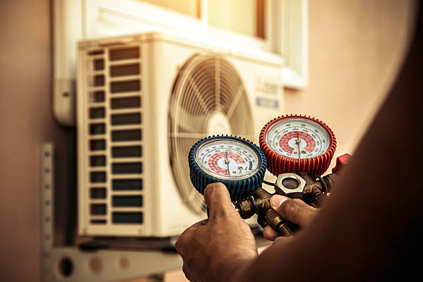 Professional Heat Pump Repair technician working in Pearl River, MS